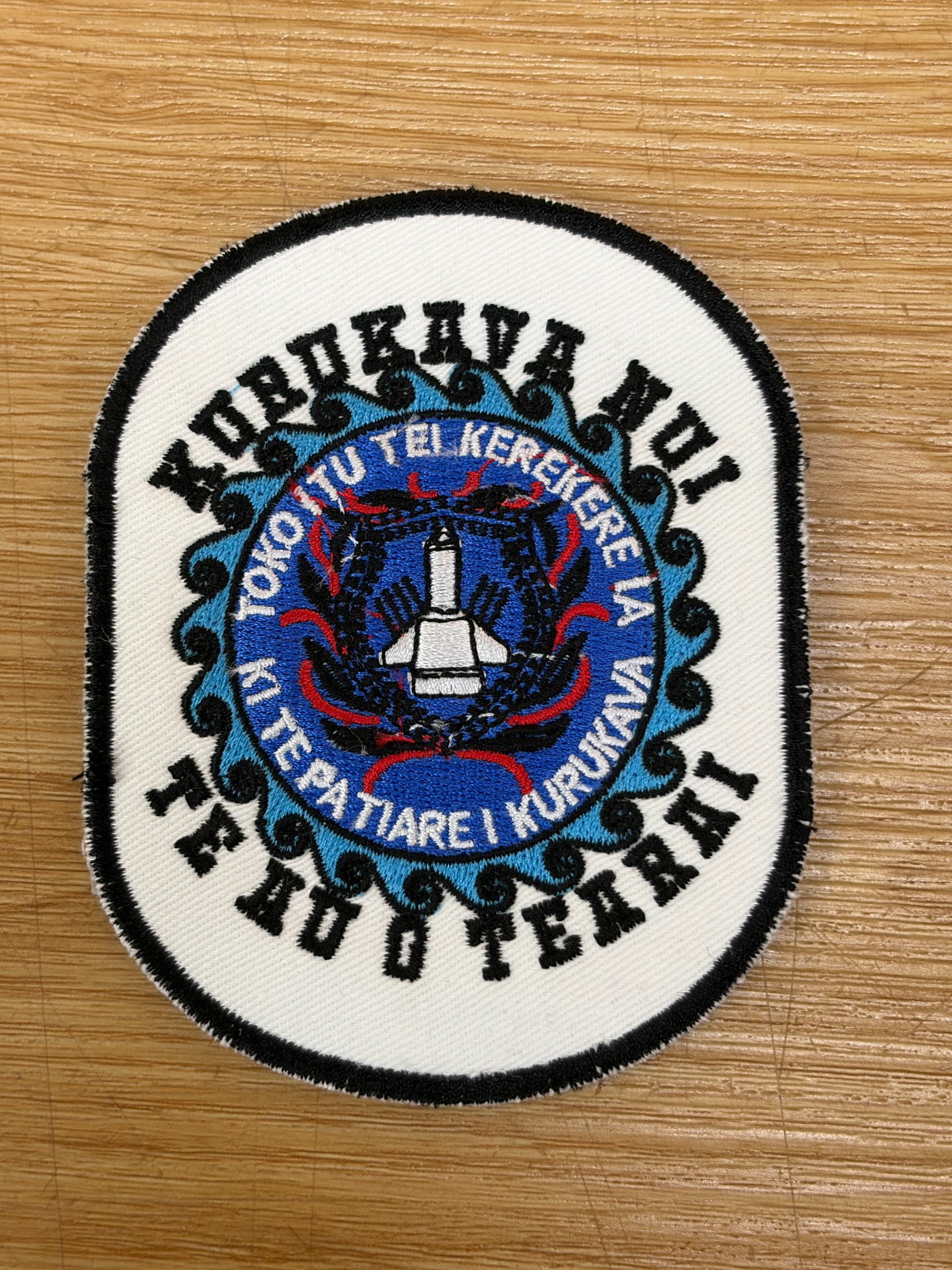 Custom white and blue round embroidery patch